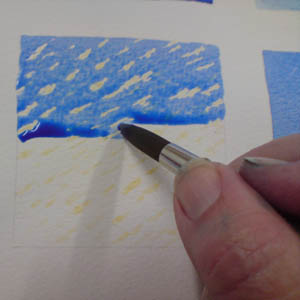 Painting over masking fluid