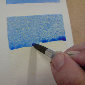 Painting over masking fluid